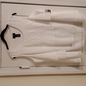 Catherine's sleeveless White shirt